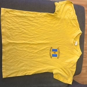 A bright yellow with the Barbados symbol